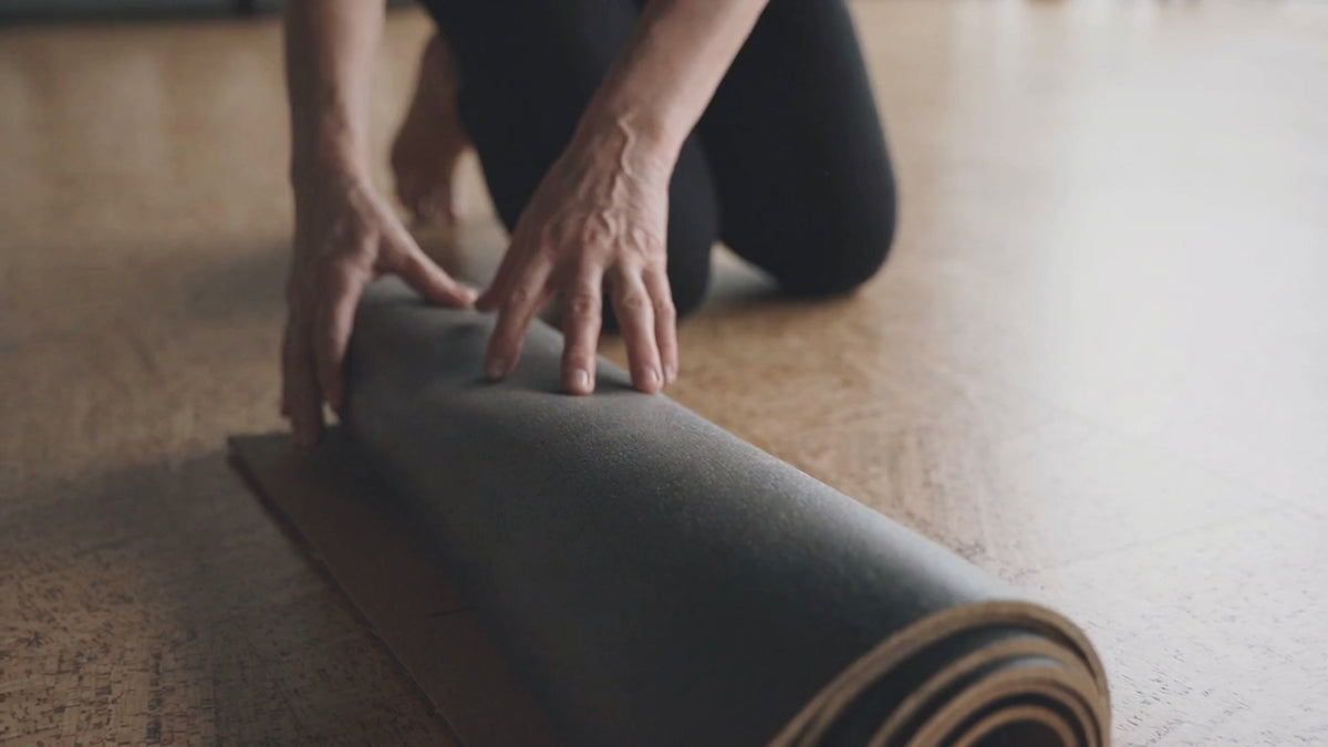 Unrolling the Heartwood cork yoga mat